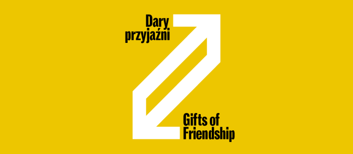 The graphic features a white geometric symbol of two interconnected arrows pointing in opposite directions, creating a dynamic diagonal on a yellow background. The black text "Gifts of Friendship" appears in the upper left corner, while the English equivalent "Dary Przyjaźni" appears in the lower right corner.