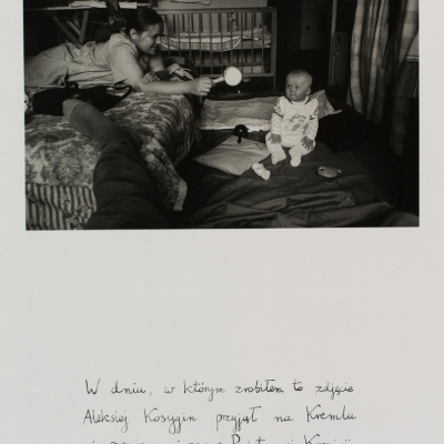 Mariusz Hermanowicz, "The day I made this photo", 1977, black-and-white photograph, from the collection of Muzeum Sztuki in Łódź: A black-and-white photograph presents a genre scene taking place in one of the rooms. In the foreground, there is the protagonist's leg, on the left side, there is a young woman facing a little child.