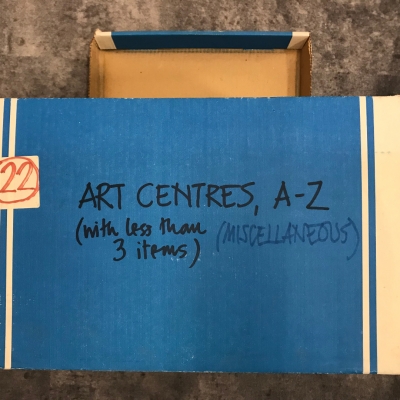 Photo of blue cardboard with black lettering