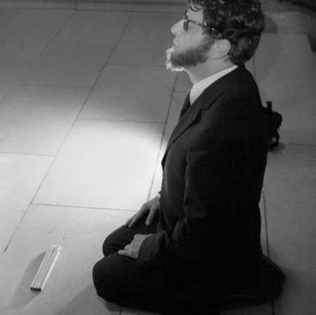 Man kneeling on the floor