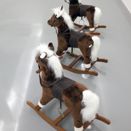 Artwork, three rocking horses