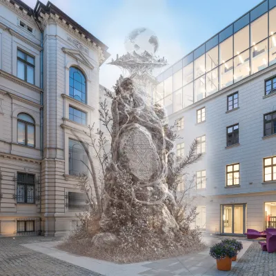 The image depicts an urban courtyard featuring a tall, rocky monument entwined with luminous fibers and topped by a globe hovering above it. The monument is situated between a classic, historic tenement house with arched windows and a modern, glass-fronted building.